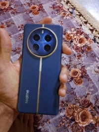 ريلمي 12 برو بلس • ٥١٢ • زووم ١٢٠