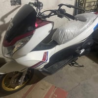 دراجة pcx درجه جديده خير من الله اوراقها موجوده شلعه و معدل شك الكاع ا...