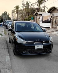 كيا ريو موديل 2022 رقم بغداد بأسمي السعر 120/$ للأستفسار 07712012637