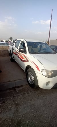 ميتسوبيشي ل200 • ٢٠٠٩ • مكينة وكير مكفولة