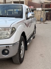 نيسان نافارا بيع فقط بدون مراوس موديل ٢٠١٢ رقم بغداد سنويه نافذه لغايه...