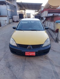 لانسر • ٢٠١٠ • كالار