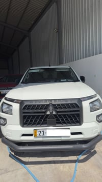 ميتسوبيشي L200 • ٢٠٢٤ • گير عادي