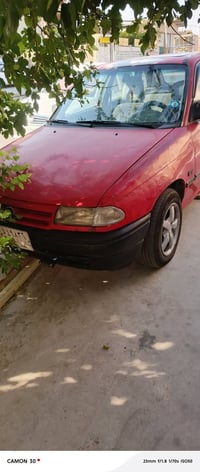اوبل استرا موديل ٩٣ رقم بغداد راعيها موجود مستمسكاته موجوده بس ماندله ...