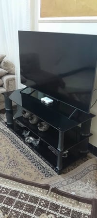 ميز تلفاز • زجاج اسود