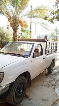 سيارة نيسان بيك اب موديل ٢٠٠٢ رقم بغداد  للتواصل الرقم الآتي : 0770623...