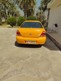 نيسان سني بدي كوري رقم بغداد موديل ٢٠٠٧ كير محرك تبريد كله جاهز عارضهه...