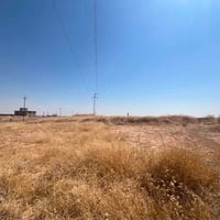 ركن تجاري • مساحة ٩٠٠م • قرية نصف تل