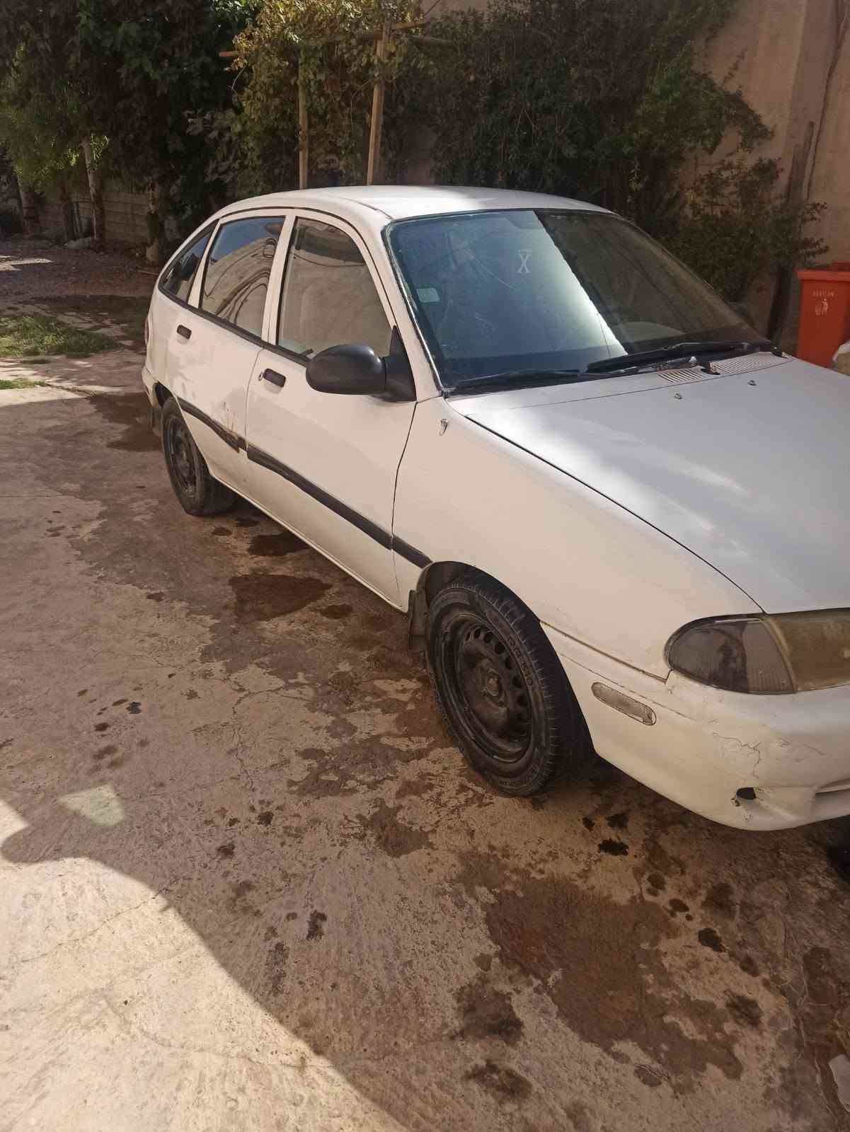 كيا موديل ١٩٩٧  كير اوتوماتيك مكينة مازدة كير و مكينة بة شةرت سنوي و رقم و واجهة و باكانة لة كةلية اصلي بي مشكله و بي عيبة لة هةوليرة سيارةكة تلفون  *********** واتساب أربيل, العراق
