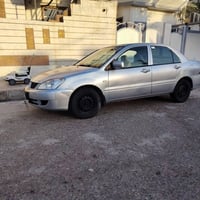 لانسر اوتوماتيك • ٢٠٠٩ • رقم اربيل