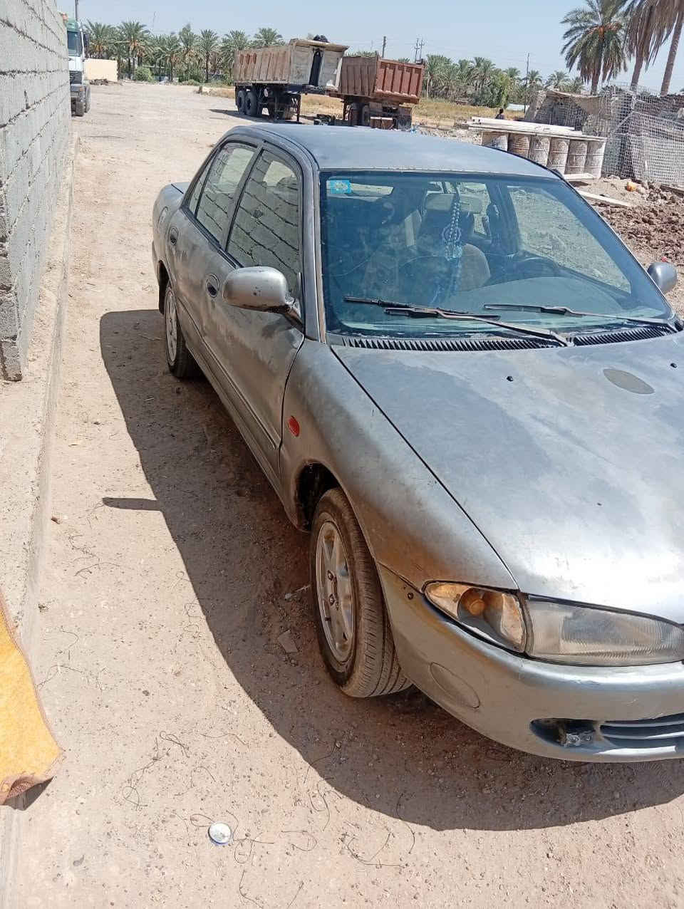 بروتون • بغداد • تاجي