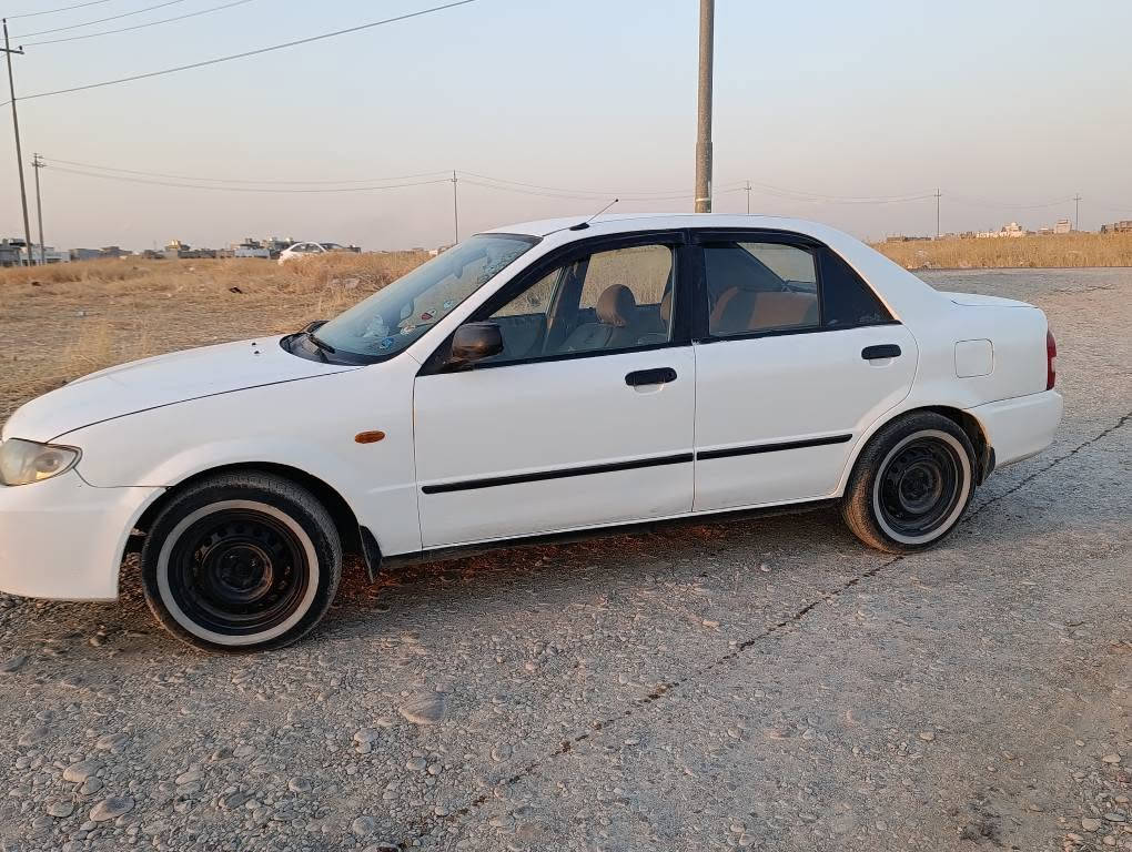 مازدە 2004گیرومەکینە بەشەرت وەرگراو براوە بەشەرت  سولف و تەبریدە تەبرید لە سلۆری ایش دەکا  سیارەکە پشی کەپسە پشتی جەمکی خەفیفی هەیە سیارەکە بس ماشاللەی دەوی *********** أربيل, العراق
