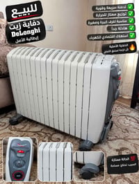 مدفئة زيتية • استعمال قليل • موصل