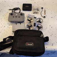 درون DJI NEO1 • ٣بطاريات • ٦عدسات