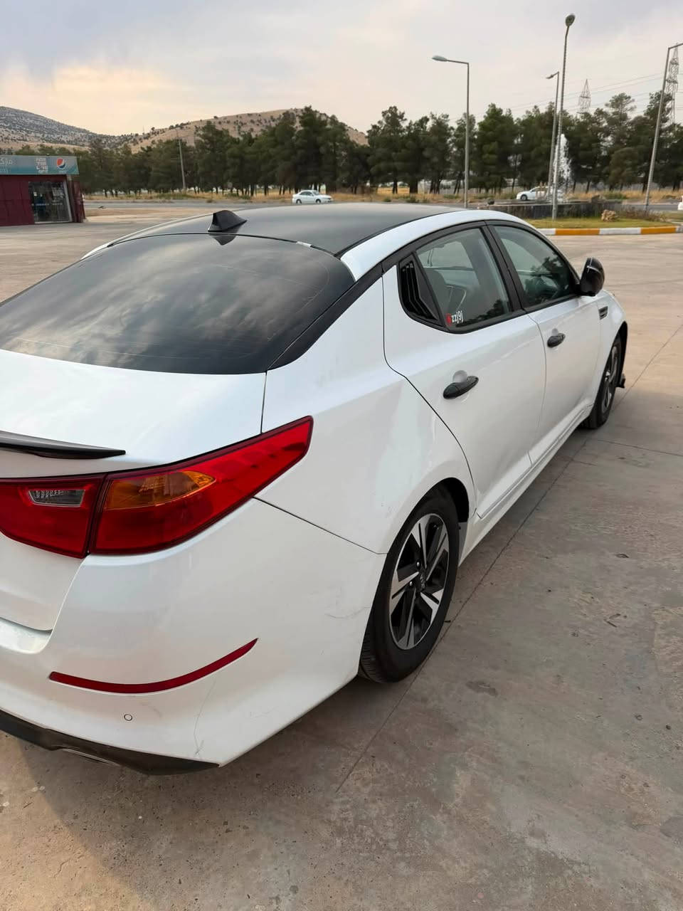 اوبتيما • ٢٠١٦ • ماشيه ١٢٢