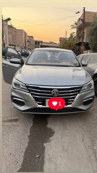 MG5 للبيع موديل 2023 فئة كومفورت لون سلفر رقم بغداد والسنوية باسمي ناف...