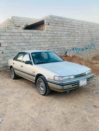 مازدا ٨٧ • محرك ٨ بخ • دفتر بنزين