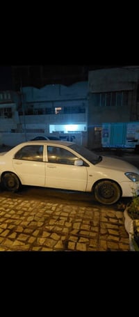 لانسر للبيع 20011بيهه خيط تبخير باب وجاملغ صبغ تبريد كهربيات دوشمه خير...