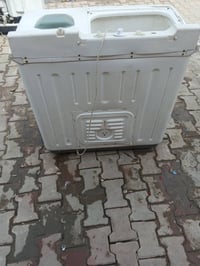 غسالة • نظيفة • ماكو باب