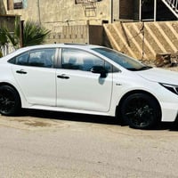 كورلا هايبرد • ١٢٠٠٠ كم • بلاك ايدشن