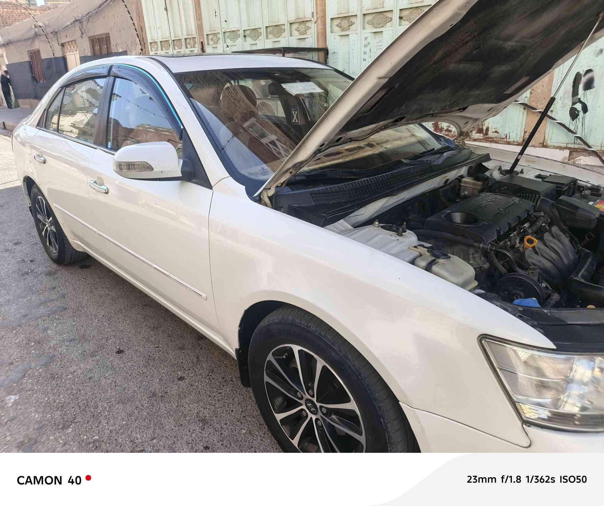 السلام عليكم سوناتا مديل 9 امريكي فول مواصفات رقم اربيل مكينه 2400دوش دواخلهه وغرفتهه جديدة  تبريد ثلج حداديه جديدة كهربايات كلهه شغاله حادثهه جاملغ امامي بس وبيهه جم قطعه السونار موجود مكان السيارة كوت واسط السعر 95 مجال بسيط ***********

نص مكتوب في الصور:
- CAMON 40 23mm f/1.8 1/325s ISO400