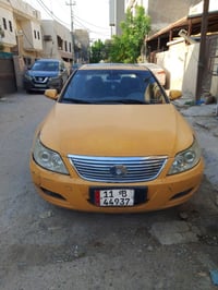 BYD F6 رقم بغداد للبيع كير ومحرك مكفول تبريد ما بيها  موديل 2011 تحويل...