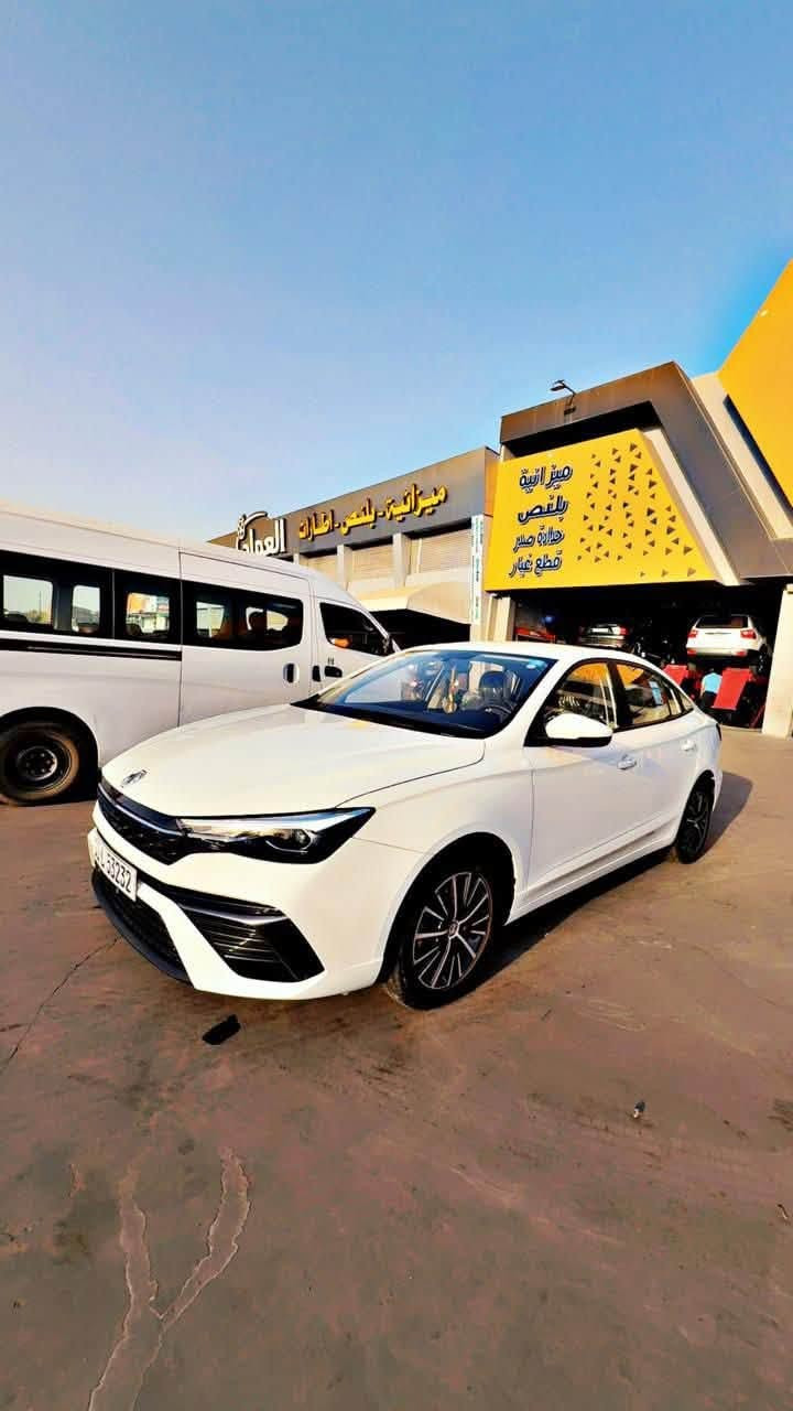 السلام عليكم سيارة MG 5 PLAS 2025 الشكل الحديث المضلع مكفولة كفالة عامة بأسمي  السيارة ماشية 31 الف بعدها داخل الضمان ضمانها 6 سنوات مكينة وكير وتبريد فول مواصفات من عدا الفتحة بصمات عدد 2 الاستفسار على رقمي *********** المكان بغداد الحرية
