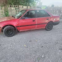 مازدا • ماكينة 1.2 • قەڵادزێ
