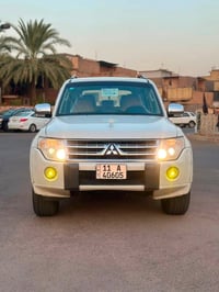 باجيرو 2010 حبتور فول مواصفات لون ابيض صدفي حجم المحرك 3500 رقم  بغداد...