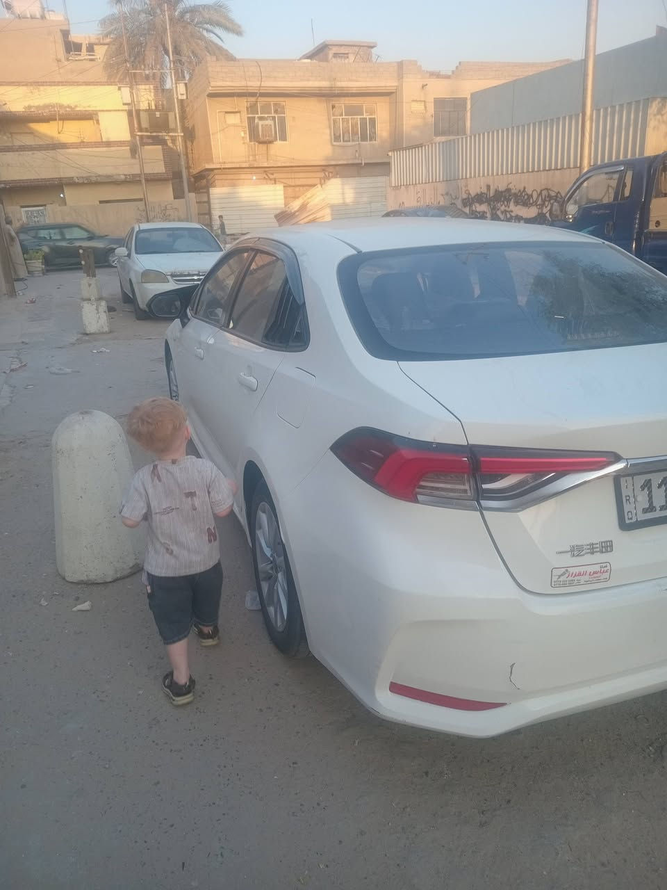 سلام عليكم
كورلا هايبرد ٢٥فول عده الكشن مو كهرباء شكل الخليجي ماشيه ٣٢ مواصفات معروفه الأضرار موضحة بالسونار فقط الدعاميات وتكحيل بصيط بقبق الجنطه 
سنويه إصدار جديد مع الهزه 
للتواصل على الرقم 
***********

نص مكتوب في الصور:
- كار تشيك الكشف عن الصبغ السمكرة البارد التبديل الخدوش المحرك الكير المنظومات الكهربائية العنوان الفرع الأول : بغداد - البياع - تقاطع درويش - مقابل المجمع السكني الفرع الثاني : بغداد -طالبية - حي جميلة -شارع خير الله- مجاور مسجد ائمة البقيع *********** *********** تاريخ الفحص 2026-09-11 الوقت 9:27:42 PM اسم صاحب السيارة احمد حميد رقم السيارة 11 F53415 النوع والموديل تويوتا كورولا/ابيض2025 ملاحظة : الفحص نافذ لمدة 3 ايام من تاريخ الفحص الجانب الايمن طخة جاملغ خلفي _ طخة جاملغ امامي _ رصعات وخدوش في الجانب الجانب الايسر طخة باب خلفي _ رصعات وخدوش في الجانب المصد الخلفي بارد وتكحيل قبق جنطة _ صبغ ومفتوحة دعامية الجزء العلوي رصعات خدوش قمارة المصد الامامي صبغ ومفتوحة دعامية _ رصعات خدوش بنيد تقرير الفحص النهائي للقطعة المرقمة : 11 F53415 النوع والموديل تويوتا كورولا/ابيض2025 بتاريخ 2026-09-11 CAR CHECK