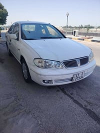 سني ياباني 2008 محرك ابيض بيهه صبغ بركن البنيد وداير اللايت الخلفي وبي...