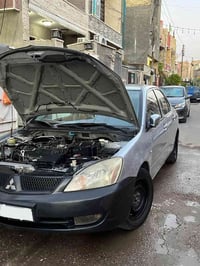 لانسر ٢٠١١ • منظومة غاز • رقم بغداد