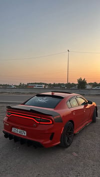 جارجر موديل 23 سياره كلش حلوه وجديده محرك 3600 تو ويل السياره رقم بغدا...