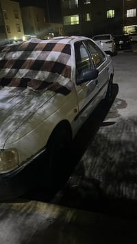 بيجو ميدل • ٢٠٠٩ • نجف