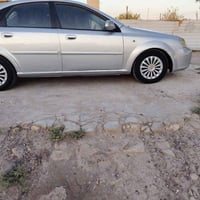 ابتره ٢٠٠٤بغداد شعب سياره بسمي كيرعادي محرك  كفاله مصبوغ جماليه بدون ض...