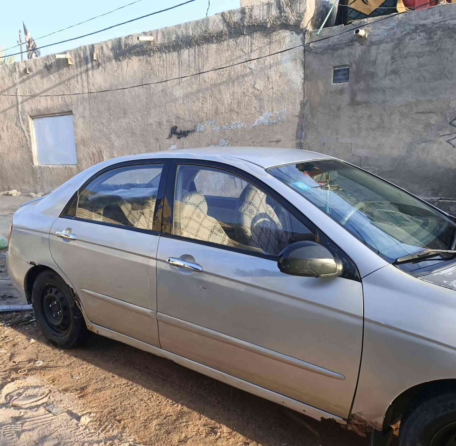 سيراتو 2006 للبيع رقم انكليزي  مميز مكفوله من الضربه السعر 60 بيها مجال *********** الموقع النجف
