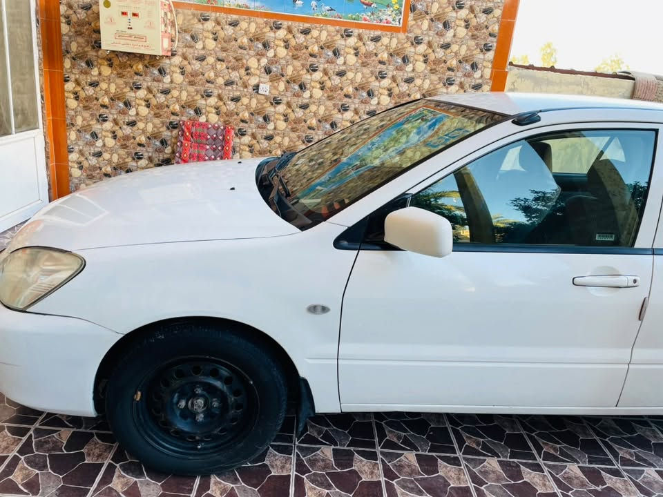 لانسر ٢٠٠٩ • مكينه ١٦٠٠ • رقم ديالى