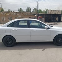 شوفرليت اوبترا 2014 بيها ضرر. جاملغ وجزء  من صندوق  محرك وكير اوتماتيك...