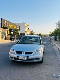 لانسر ٢٠١١ • توماتيك • شمشمل
