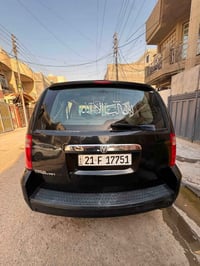 دوج كرفان ٢٠٠٨مكينه ٣٨٠٠جديده السياره فول ومناقصها اي شي رقم 077260534...