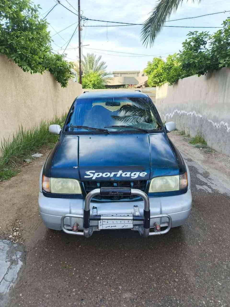 سياره سبورتج موديل 99 سيارة حلوه مابيه صبغ ولاتصليح بيه مشكله كهرباء جام ماينزل ودشبول طافي حداده ومحرك مانقصه شي السعر 40وبيه مجال مكان اعوريج اقواس بغداد ***********

