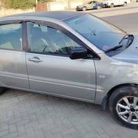 لانسر ٢٠٠٢ • مكينة ٢٠٠٠ • حادث جنطة