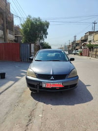 لانسر • ٢٠١٠ • اوتوماتيك