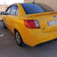 السلا م عليكم كيا ريو 2010 السياره فول ضرار بس داير مكينه وكير شرط هيئ...