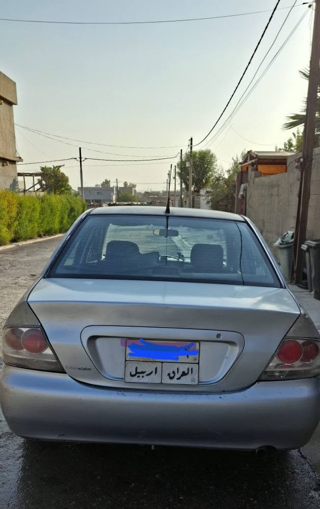 لانسەر مۆدیل 2008
تەنها سندوقی گۆڕاوە 
سەیارەکی خاوێن و بێ کێشەیە 
سەنەوی بەسەر چوە.
*********** أربيل, العراق
