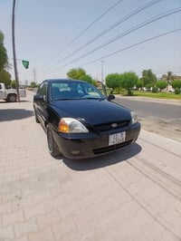 عندي كيا ريو 2004 كير عادي  محرك 1500 خير من الله سيارة جاهزة علة اخر ...