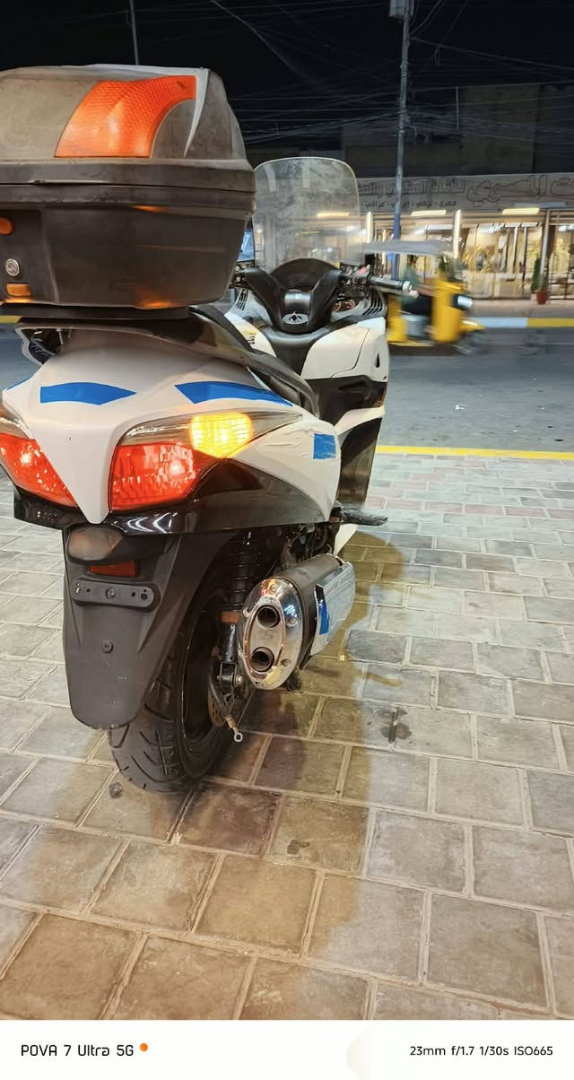 سلام عليكم للبيع سلفر ونج جي تي حديث ياباني  مكينه 400cc بل كارتون منفيس أوراق معرض موجوده بلاديه مكفوله ناعمه لأدخانه ولاصوت ولانضوح معدلها 180 ستان حساس اي بي إس وجي بي إس اوفر مود جنطه بلادي  جامه طويله بلاديه كهربائيات شغاله من طول لطول عل بلاد تجي تشغل وترايك وين ما يعجبك جواها تخم تاير جديد مكاني بغداد  الامين السعر مليونين  رقمي *********** للشراي يتصل وبخدمته

نص مكتوب في الصور:
- POVA 7 Ultra 5G
- 23mm f/1.7 1/30s ISO541
- 23mm f/1.7 1/30s ISO424
- POVA 7 Ultra 5G  23mm f/1.7 1/30s ISO665