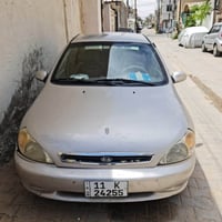 كيا ريو • ٢٠٠٢ • رقم بغداد الدولي