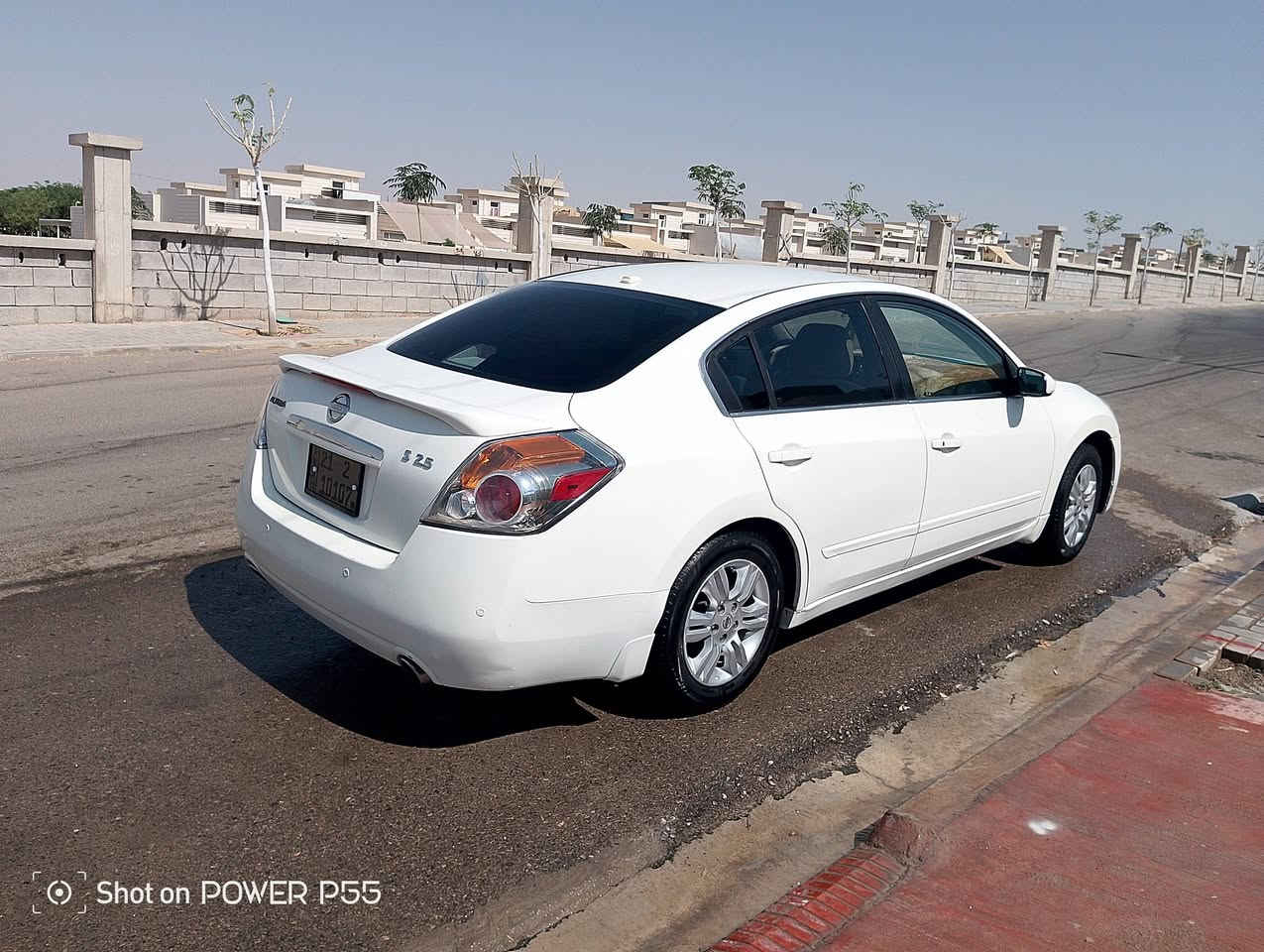 ئاڵتیما 2009
ساق کودی بۆ کراوە هەموو گیانی بەشەرت
***********

نص مكتوب في الصور:
- Shot on POWER P55