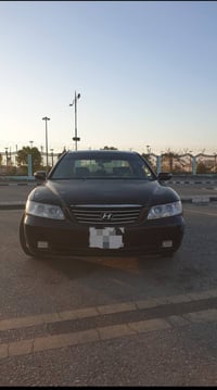 أزيرا 2009 • V6 3.3 • گصة جنطة